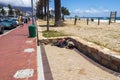 Poor homeless man sleeps on the street in South Africa