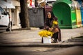 Poor homeless old woman sells flowers on the street in an attempt to pursue in Burgas/Bulgaria/03/08/2016. Editorial use only.