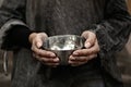 Poor homeless woman with empty bowl, closeup Royalty Free Stock Photo