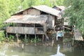 Poor house above river Royalty Free Stock Photo