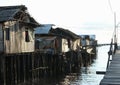 Poor houses above sea Royalty Free Stock Photo