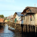 Poor houses above sea Royalty Free Stock Photo