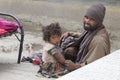 Poor Indian beggar family on street in Ladakh. India Royalty Free Stock Photo