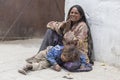 Poor Indian beggar family on street in Ladakh. India Royalty Free Stock Photo