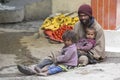 Poor Indian beggar family on street in Leh, Ladakh, India Royalty Free Stock Photo