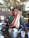 Indian poor Hindu woman working in a hotel for her daily earning