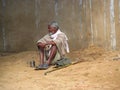 Poor indian man with a beard begging for the money on the street Royalty Free Stock Photo