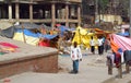 Poor indian people living in a shack in the city slum