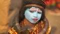 Poor kid in god Shiva stress Dress made himself as shiva close up face image