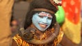 Poor kid smiling in god Shiva stress Dress made himself as shiva