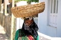 poor lady selling vegetable