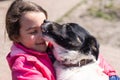 poor little girl with a dog in village Royalty Free Stock Photo