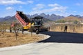 A paver is paving a tarmac road in the poor mountainous areas of northern China Royalty Free Stock Photo