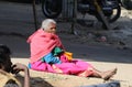 A poor old lady in slum