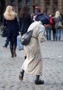 Poor old woman begging in Brussels