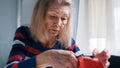 Poor old woman counting coins on the table. Low pension and insufficient funds Royalty Free Stock Photo