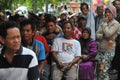 Poor people queued cash assistance from the government