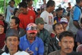 Poor people queued cash assistance from the government