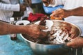 Poor people's hands share free food from volunteers who donate food : concept of feeding, sharing food