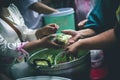 Poor people's hands share free food from volunteers who donate food : concept of feeding, sharing food