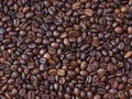 Poor bad quality roasted mixed coffee beans pattern background. Roasted coffee beans background.