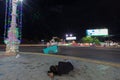 Poor sleeper on the ground at night in Sihanoukville, Poverty in