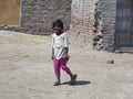 Poor small girl in Pakistani village