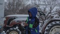 Poor Syrian Refugee Boy in a Refuge Camp at time of snow storm