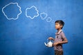 poor tea selling kid thinking by holding tea glass and container in hand with cloud doodle drawing on blue background -