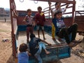 poor village childrens plying at van, hanging, climbing in vehicle in india January 2020