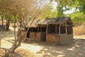 A poor village hut made of wood and clay. The traditional African home of the poor