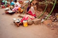 Poor woman near road