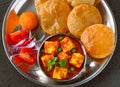 Poori bhaji with salad