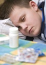 Poorly boy sleeping in bed Royalty Free Stock Photo