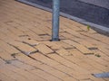 Poorly laid paving slabs. Poor quality work. Danger to pedestrians