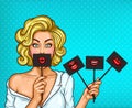 Pop art blond girl covering her mouth with black sign on stick with red lips.