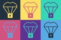 Pop art Box flying on parachute icon isolated on color background. Parcel with parachute for shipping. Delivery service Royalty Free Stock Photo