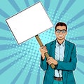 Pop art businessman with blank banner on wooden stick. Royalty Free Stock Photo