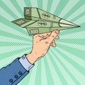 Pop Art Businessman Hand Throwing Dollar Paper Plane Royalty Free Stock Photo