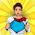 Pop art female superhero shows superhero t-shirt. Vector illustration in pop art comic style.