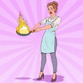 Pop Art Housewife in the Kitchen Holding Pan. Afraid Young Woman in Apron Cooking with Burning Pan