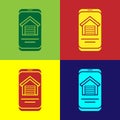 Pop art Online real estate house on smartphone icon isolated on color background. Home loan concept, rent, buy, buying a Royalty Free Stock Photo