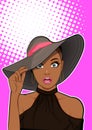 Surprised black woman with hat looking Royalty Free Stock Photo