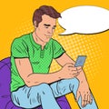 Pop Art Young Man is Reading Text Message on Smartphone. Mobile Technologies Royalty Free Stock Photo