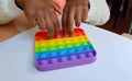 Pop it bright popular novelty antistress toy for the development of fine motor skills of fingers in children and adults