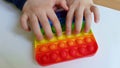 Pop it bright popular novelty antistress toy for the development of fine motor skills of fingers in children and adults