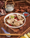 Pop chicken filled with chili sauce served in a white bowl Royalty Free Stock Photo