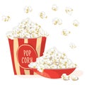 Pop Corn in a red bowl with Pop Corn in a red stripped pack.