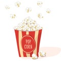 Pop Corn in a red stripped pack. Flat vector. Popcorn illustration, on white background