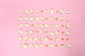 Pop corn symmetric on pink paper